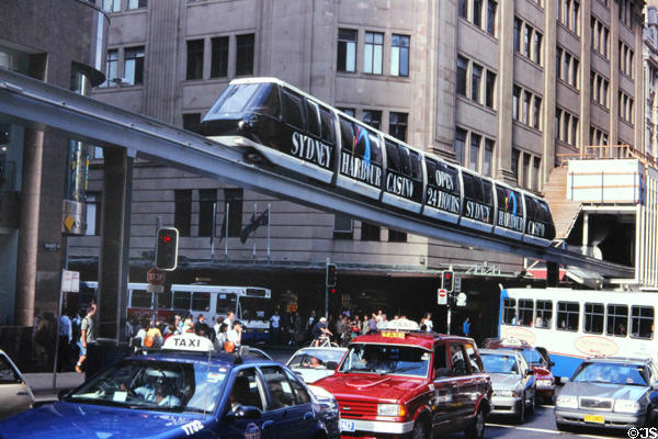 Monorail train runs above Sydney traffic. Sydney, Australia.