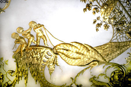 Roccoco wall panel detail with cherubs fishing in Sanssouci Palace. Potsdam, Germany.