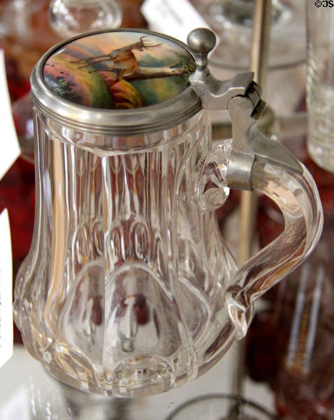 German glass bier krug (c1840) with lid enameled with deer at German Hunting & Fishing Museum. Munich, Germany.