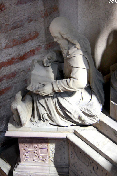 Evangelist John statue on base of pulpit at Trier Cathedral. Trier, Germany.