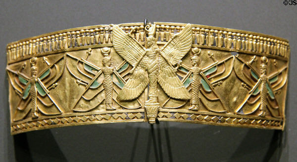 Armband with standing goddess of gold & glass at Museum Ägyptischer Kunst. Munich, Germany.