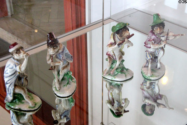 Faience ape orchestra figures (c1745-54) by Paul Hannong of Strasbourg, France at Bamberg Old Town Hall Museum of Faience & Porcelain. Bamberg, Germany.