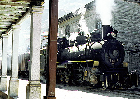 Steam train sitting in the streets of Alausí about to depart for its run to Guayaquil. Ecuador.