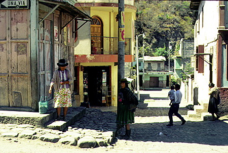 Watching as the steam train arrives in a small town in Ecuador.