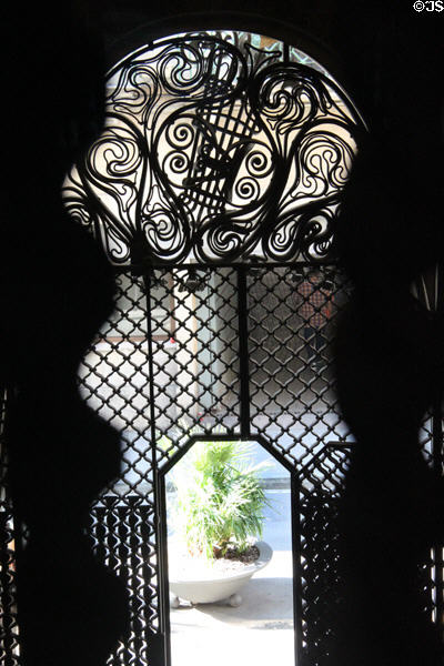 Wrought iron gate of Palau Güell seen from inside. Barcelona, Spain.