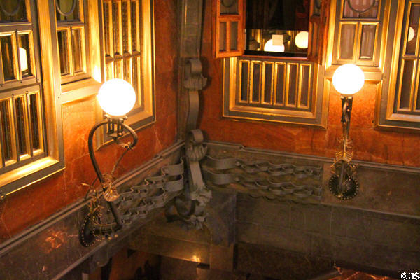 Lamps & ironwork decorations in central hall at Palau Güell. Barcelona, Spain.