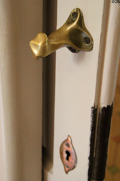 Gaudi designed door pull hardware in museum apartment at Casa Milà. Barcelona, Spain.