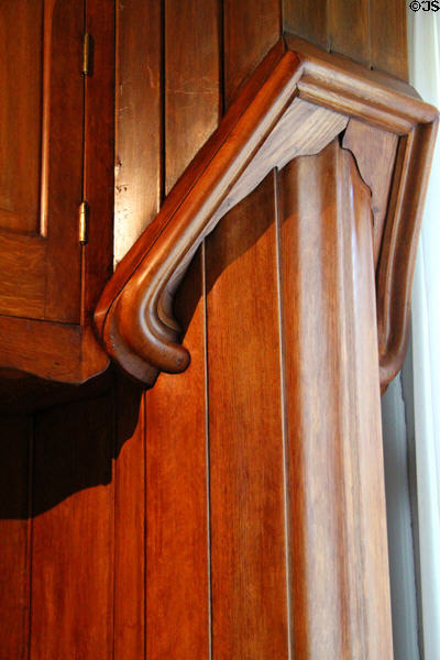 Detail of cabinet designed to encase pillar along irregular wall in Casa Milà by Antoni Gaudí at Gaudi House Museum in Parc Güell. Barcelona, Spain.