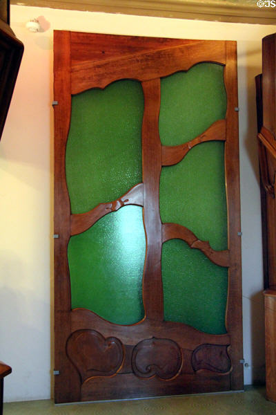 Modernista door designed for Casa Milà in Barcelona by Antoni Gaudí at Gaudi House Museum in Parc Güell. Barcelona, Spain.