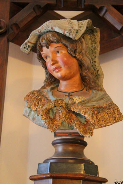 Bust on corner fireplace (1880) designed for Casa Vicens in Alella by Antoni Gaudí at Gaudi House Museum in Parc Güell. Barcelona, Spain.