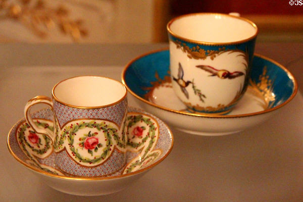 Painted porcelain cups & saucers (1770s) by Royal Porcelain of Vincennes at Louvre Museum. Paris, France.
