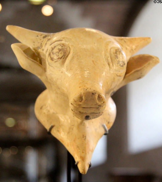 Greek terracotta Rhyton (ritual drinking cup) in shape of bull's head at Louvre Museum. Paris, France.