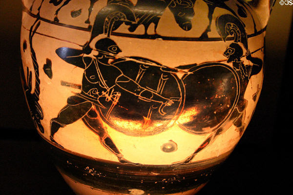 Greek terracotta amphora with soldiers in combat (560-540 BCE) from Calabria in Italy at Louvre Museum. Paris, France.