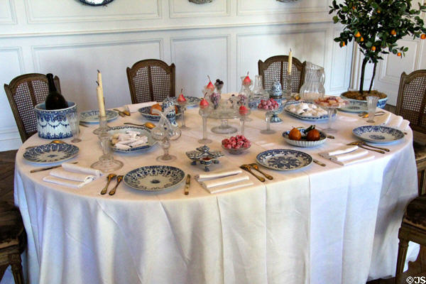 Table set with Rouen-made pottery (18thC) at Rouen Ceramic Museum. Rouen, France.