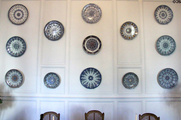 Rouen-made earthenware plates in several blue patterns (18thC) at Rouen Ceramic Museum. Rouen, France.