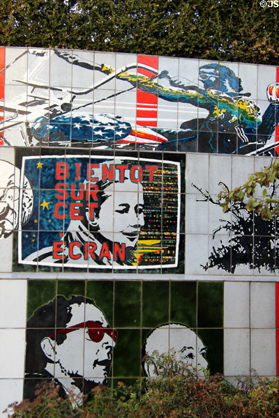 Film scenes on mural of film history in park between metro station & Lumière Museum. Lyon, France.