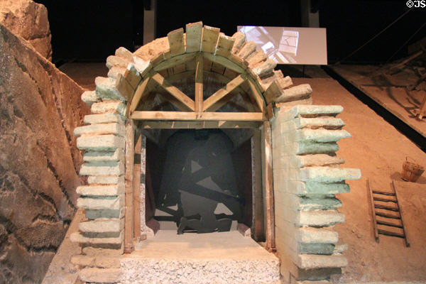 Full scale model Roman aqueduct canal construction covered by arches or capped with flat stones & waterproofed with terra cotta plaster at Pont du Gard museum. Nimes, France.
