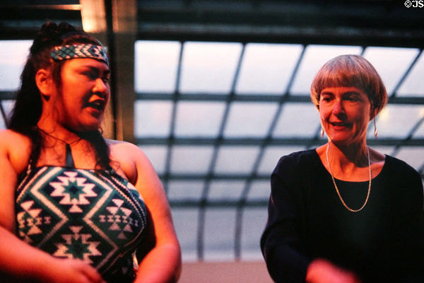 Maori performer with visitor. New Zealand.