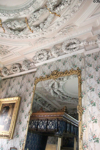 Great mirror & sculpted ceiling of grand bed chamber at Thirlestane Castle. Scotland.