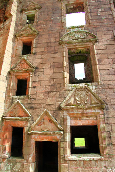 Arms & symbolic figures in facade pediments of Nithsdale Lodging at Caerlaverock Castle. Caerlaverock, Scotland.
