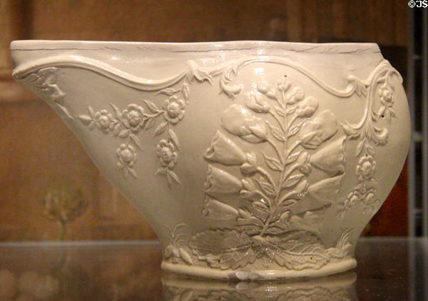 Block molded salt-glazed stoneware with foxglove pattern (1760-2) possibly by William Greatbatch of Fenton at World of Wedgwood. Barlaston, Stoke, England.