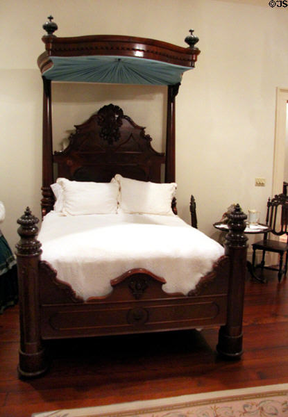 Canopy bed (half tester) where mosquito netting would be draped from canopy onto rods extended from front posts at Bragg-Mitchell Mansion. Mobile, AL.