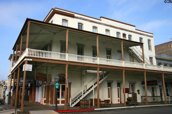 Heritage brick building with verandas at corner of 2nd & J Sts. in Old Sacramento. Sacramento, CA.