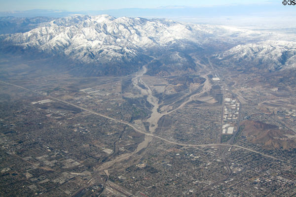 Aerial view along Barstow Freeway & Old Route 66 up mountains. CA.