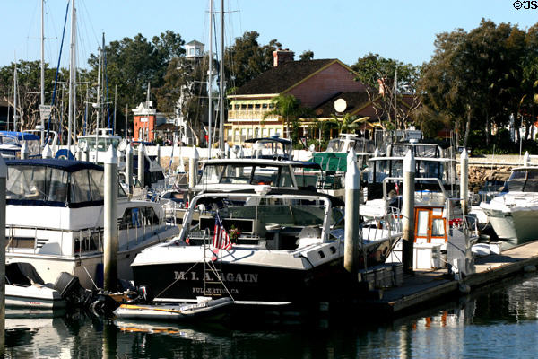 Pleasure craft in Marina with Seaport Village beyond. San Diego, CA.