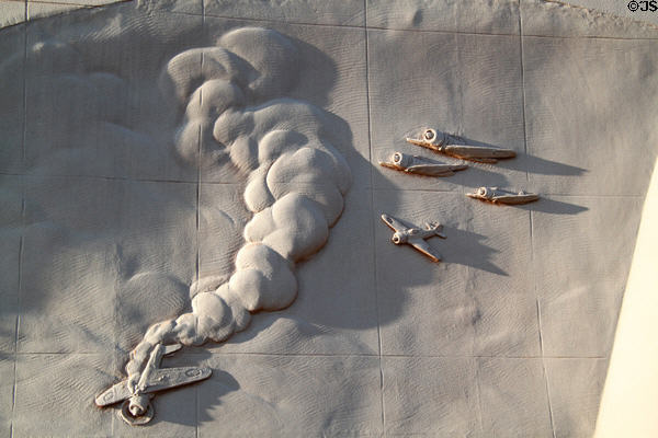 Detail of air battle on carved relief of USS San Diego at its memorial. San Diego, CA.