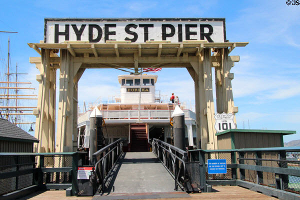 Ferry boat Eureka at Hyde Street Pier shows Redwood Highway US 101 sign at Maritime National Historical Park. San Francisco, CA.