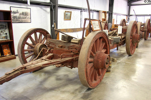 Log wagon pulled by teams of oxen, mules or horses which could haul ten tons of logs at Angels Camp Museum. Angels Camp, CA.