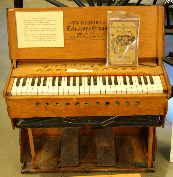 The Billhorn Telescope organ, Chicago IL, which can be collapsed small enough to fit on back of horse & was often rented by traveling preachers passing though Angels Camp at Angels Camp Museum. Angels Camp, CA.