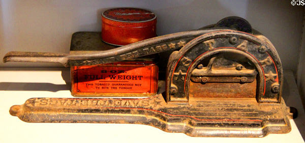 Antique tobacco cutting machine & tins at Calaveras County Downtown Museum. San Andreas, CA.