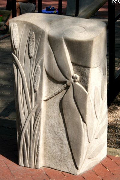 Dragonfly sculpture on decorative bridge on Pearl Street Mall. Boulder, CO.
