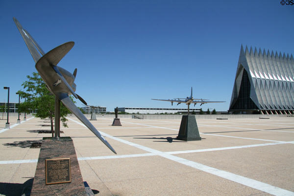 P-40 Warhawk commemorative model flies toward Cadet Chapel at USAF Academy. Colorado Springs, CO.