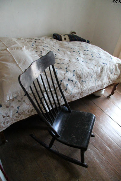Bed & rocking chair at Baca Adobe House. Trinidad, CO.