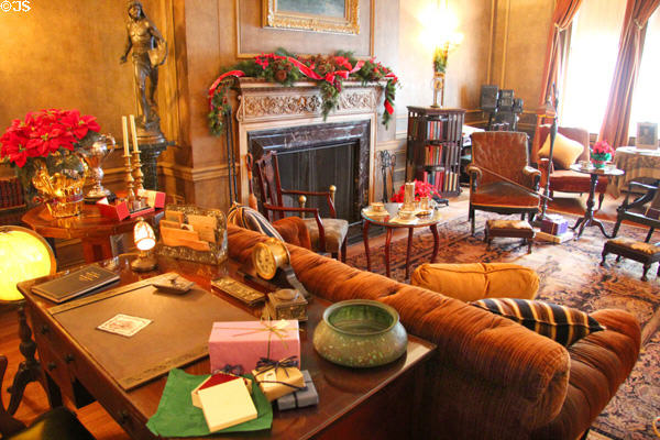 Library at Woodrow Wilson House looking over desk to fireplace. Washington, DC.