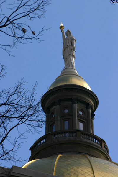 Woman with sword & flame on Georgia State House dome cupola. Atlanta, GA.