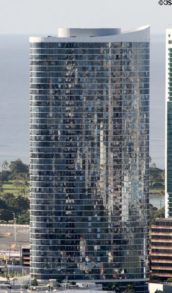 Facade of oval Moana Pacific Tower (2007) (1288 Kapiolani Blvd.). Honolulu, HI.
