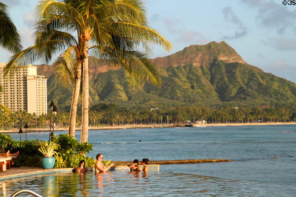 Diamond Head over hotel pool in Waikiki. Waikiki, HI.