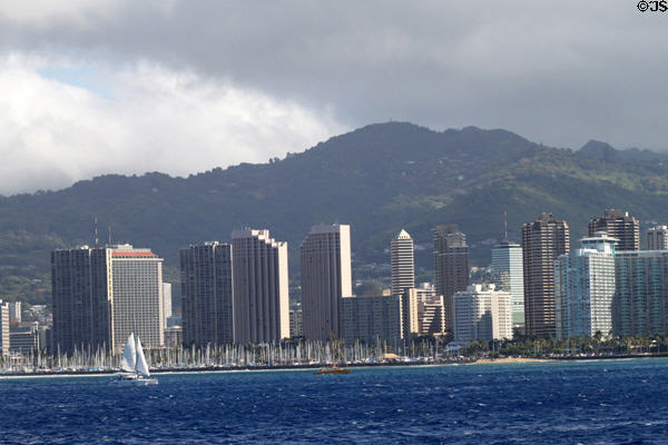 Waikiki Yacht Harbor before Ala Moana district & hills beyond. Waikiki, HI.