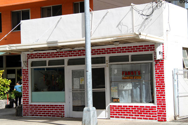 Small commercial building remnant of pre-condo era in Waikiki. Waikiki, HI.