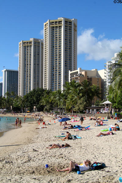 Octagonal twin Hyatt Regency Waikiki Towers over beach. Waikiki, HI.