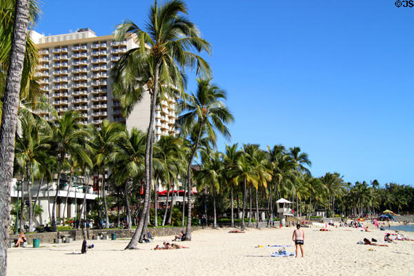 Kalakaua Ave. streetscape with Aston Waikiki Beach Hotel. Waikiki, HI.