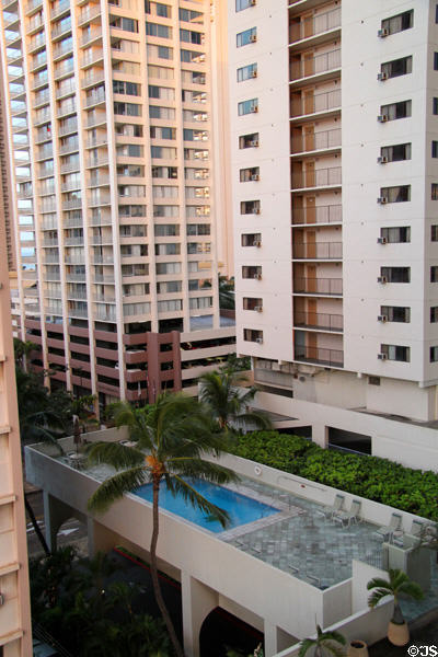 Swimming pool tucked in among Waikiki condos. Waikiki, HI.