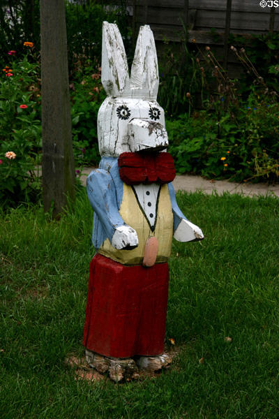 Rabbit carving on lawn. High Amana, IA.