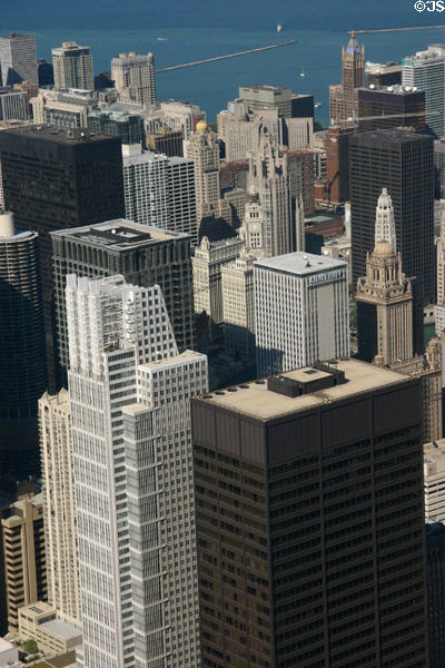 Area around Wrigley Tower & Chicago River with white Chicago Title & black Daley towers in foreground from Sears Tower. Chicago, IL.