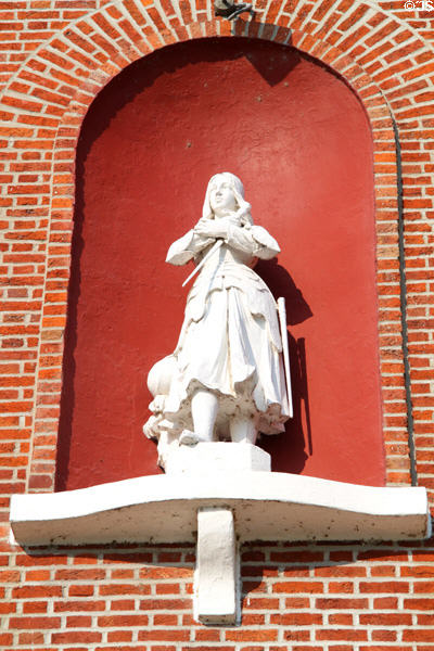 St Joan of Arc on front of Old Cathedral. Vincennes, IN.