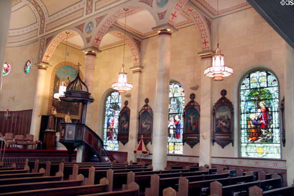 Side aisle with stained-glass windows in Old Cathedral. Vincennes, IN.
